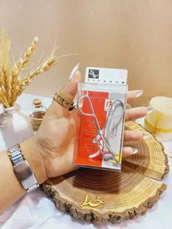 فرمژه دسته فنری تیتانیوم طلق دار مدل Pinzette Tweezers - فروشگاه عمده لوازم آرایشی ورانی