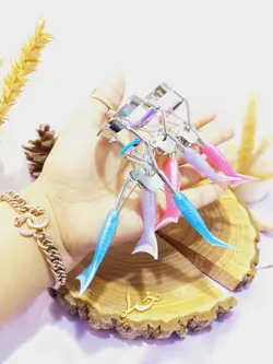 فرمژه دسته ماهی استیل رنگی مدل EYELASH CURLER - فروشگاه عمده لوازم آرایشی ورانی