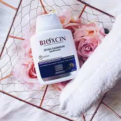 شامپو بیوکسین ضد ریزش سیر سیاه مناسب انواع مو حجم 300 میلی - فروشگاه جان به به