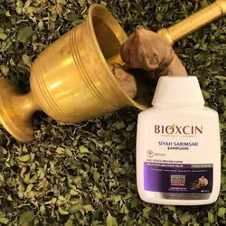 شامپو بیوکسین ضد ریزش سیر سیاه مناسب انواع مو حجم 300 میلی - فروشگاه جان به به