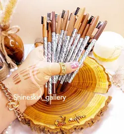 مداد ابرو شانه دار دوسه روکش نقره ای - شاین اسکین گالری