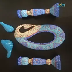 آینه و شمعدان میناکاری زینت بخش سفره هفت سین از بهترین جنس مس لعاب شده