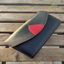 کیف دستی از چرم طبیعی گاوی، دوخته شده با نخ موم زده ترک