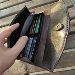 کیف دستی از چرم طبیعی گاوی، دوخته شده با نخ موم زده ترک