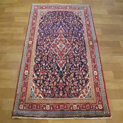 فرش دستباف جوزان ملاير طرح لچک و ترنج سایز ذرع و نيم رنگ زمینه سرمه اي رنگ حاشیه لاكي کد 38940