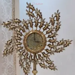 ساعت دیواری طرح فرفره ساخته شده از آلومینیوم با روکش برنز با رنگ ثابت و ماندگار