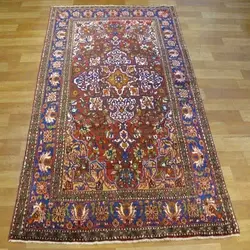 فرش دستباف مبارکه طرح لچک و ترنج سایز قاليچه رنگ زمینه لاكي رنگ حاشیه سرمه اي کد ۳۹۳۶۱