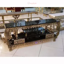 میز تلوزیون طرح طاووس دو کشو با طراحی جدید و رویه شیشه ای با رنگ ثابت و ماندگار