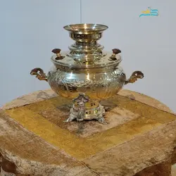 سماور ذغالی برنجی ۶ لیتری مدل توپی قلم زنی تخت جمشید ورق ضخیم