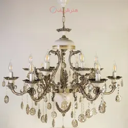 لوستر اسپانیایی 6 شاخه هر شاخه 2 شعله، بدنه برنزی و رنگ آنتیک