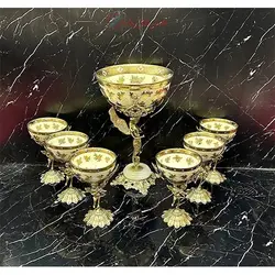 هفت سین زیبا و درخشان از جنس برنز، طرح فرشته بالدار بر روی پایه صدفی