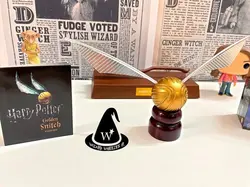 گلدن اسنیچ با کتابچه استیکر هری پاتر