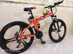 دوچرخه تاشو سایز ۲۶ ،۲۴ و ۲۷ SUPER GOLD سوپر گلد ، رینگ‌ سه پره رنگ‌ نارنجی همراه با هدیه