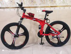دوچرخه تاشو سایز ۲۶، ۲۴ و ۲۷ SUPER GOLD سوپر گلد ، رینگ‌ سه پره رنگ قرمز همراه با هدیه
