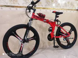 دوچرخه تاشو سایز ۲۶، ۲۴ و ۲۷ SUPER GOLD سوپر گلد ، رینگ‌ سه پره رنگ قرمز همراه با هدیه