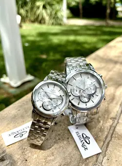 ست ساعت زنانه و مردانه الگانس ☑️ELEGANCE     ☆Zurich☆ ▪︎Cornograf ▪️High quality #ساعت ست زنونه مردونه الگانس کدساعت cx_ 951Gسه موتور فعال دارای روز شمار قفل استیل پروانه ای (مخفی) بند استیل موتورکوارتز کرنو