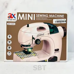 اسباب بازی چرخ خیاطی موزیکال كودك جعبه دار - اسباب بازی ترگل