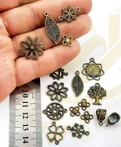 خرجکار خورشید برنزی کد234 - ساخت زیورآلات-دستبند-پابند-خرازی آنلاین-پلاک خورشید