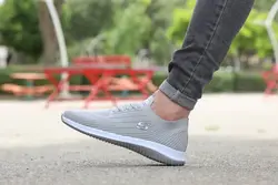 کفش مردانه و زنانه اسکچرز مدل بافت طوسی