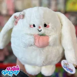 عروسک خرگوش هلو به دست