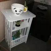 میز تلفن و روزنامه