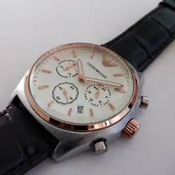 ساعت مچی عقربه‌ای مردانه مدل بندچرمی قاب فلزی تاریخ شمار سه موتور کرنوگراف کد 2