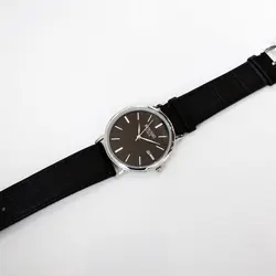 ساعت مچی عقربه‌ای مردانه مدل بندچرم پوست ماری تاریخ شمار کد 2