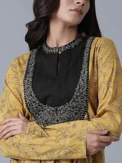 پیراهن زرد رنگ طرحدار دبلیو