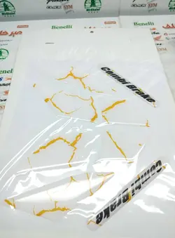 پد (برچسب) ارم ژله ای سر گلگیر جلو موتور کلیک و طرح کلیک (سفید رگه نارنجی)