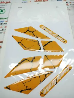 پد (برچسب) ارم ژله ای سر گلگیر جلو موتور کلیک و طرح کلیک (نارنجی رگه مشکی)