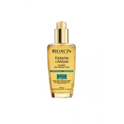 روغن کراتین و آرگان ترمیم کننده و ضد ریزش موها بیوکسین BIOXCIN حجم 150 میل